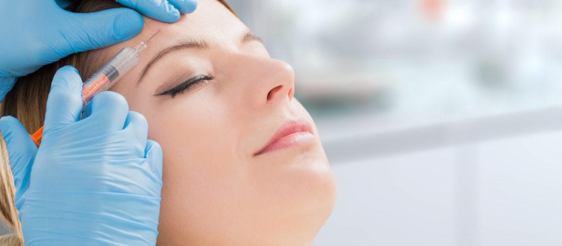 botox woman fillers spa facial young treatment syringe injecting injection skin lips concept - stock image